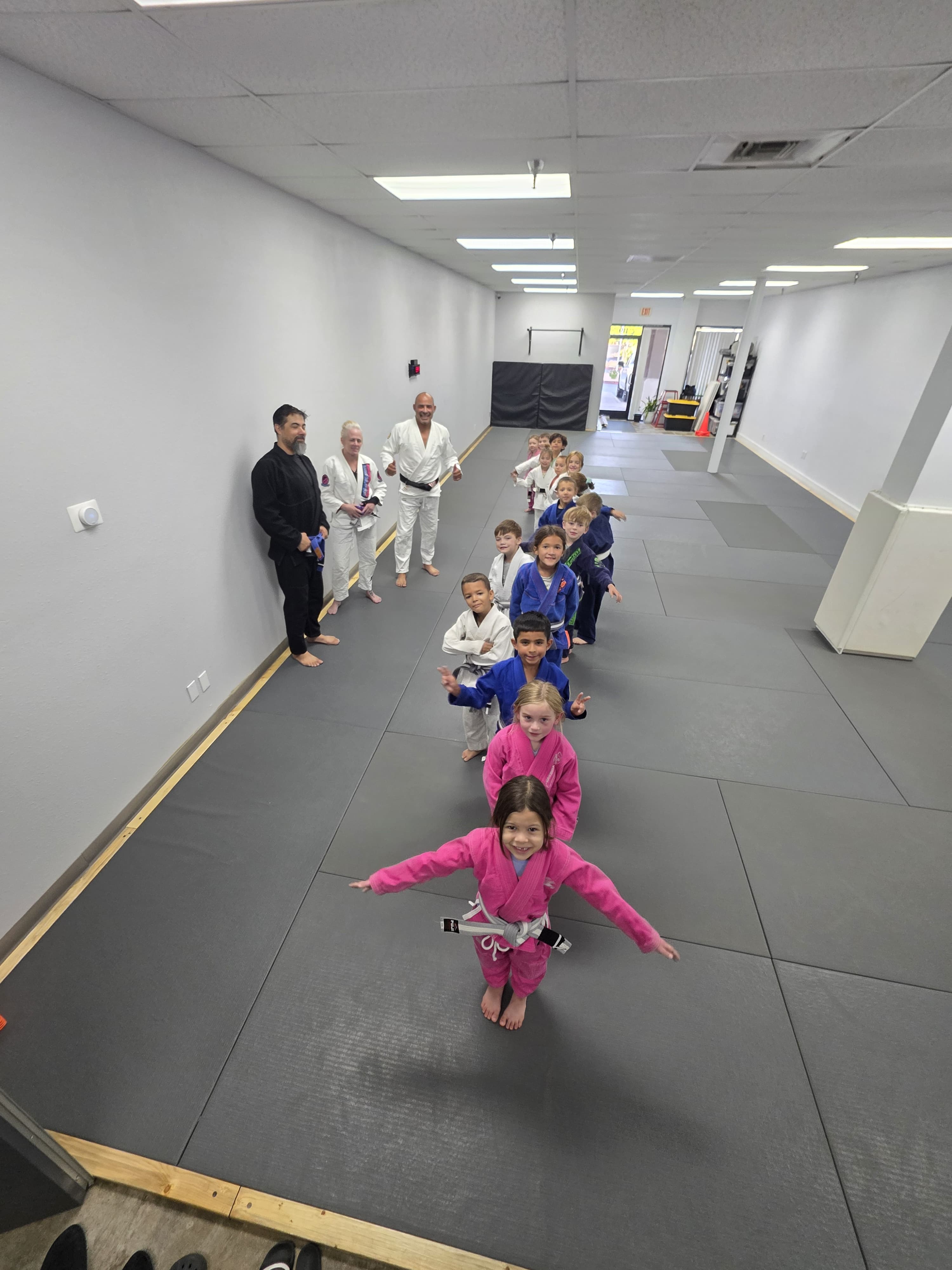 Kids lined up for class at Ares Arizona BJJ Mesa